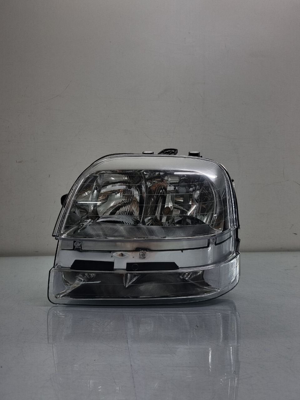 Farol lado esquerdo cromado com auxiliar doblo 2002 a 2010