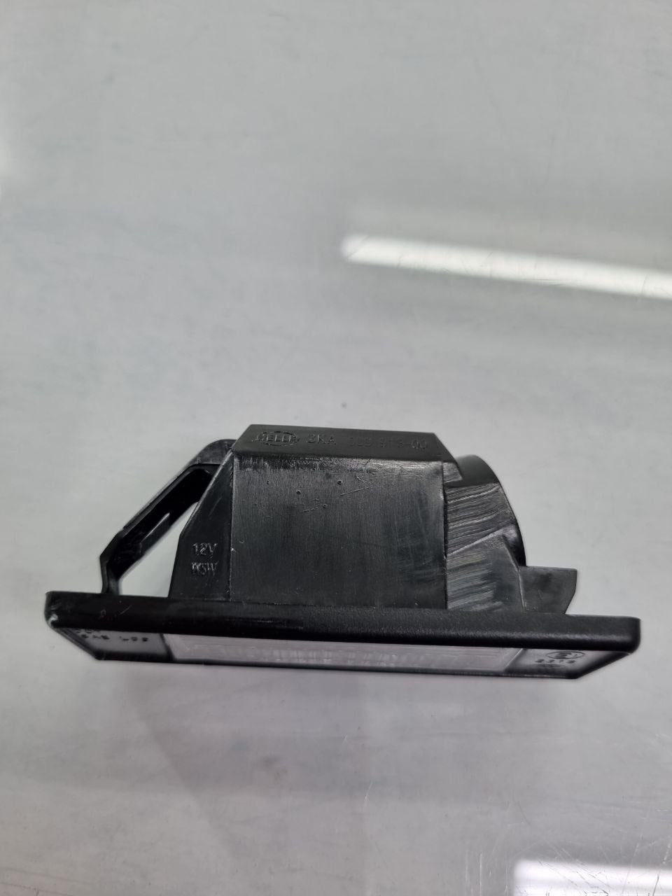 Lanterna Luz de Placa Nissan Versa/Kicks 2012/2024 Nova