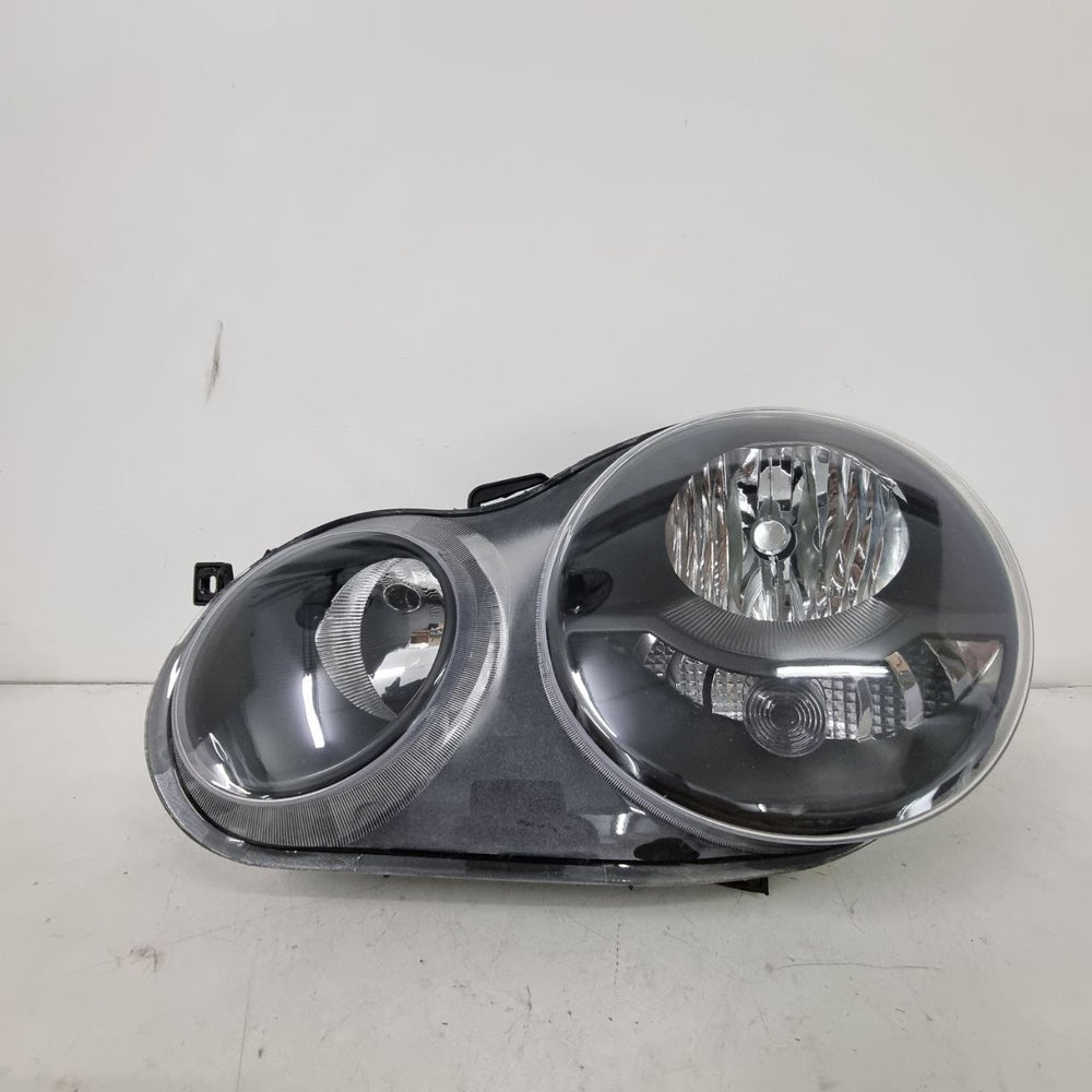 Farol Diant Esq Volkswagen Polo Hatch/Sedan 2002/2005