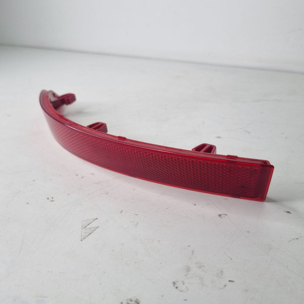 Refletor Parachoque Tras Esq Volkswagen Saveiro 2018/2023