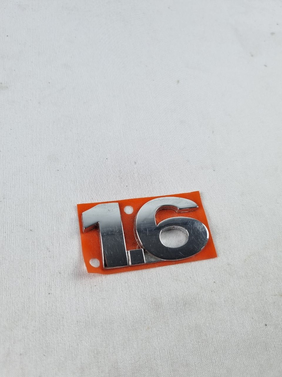 Emblema Tras 1.6 Volkswagen Gol Voyage Fox 2004/2010