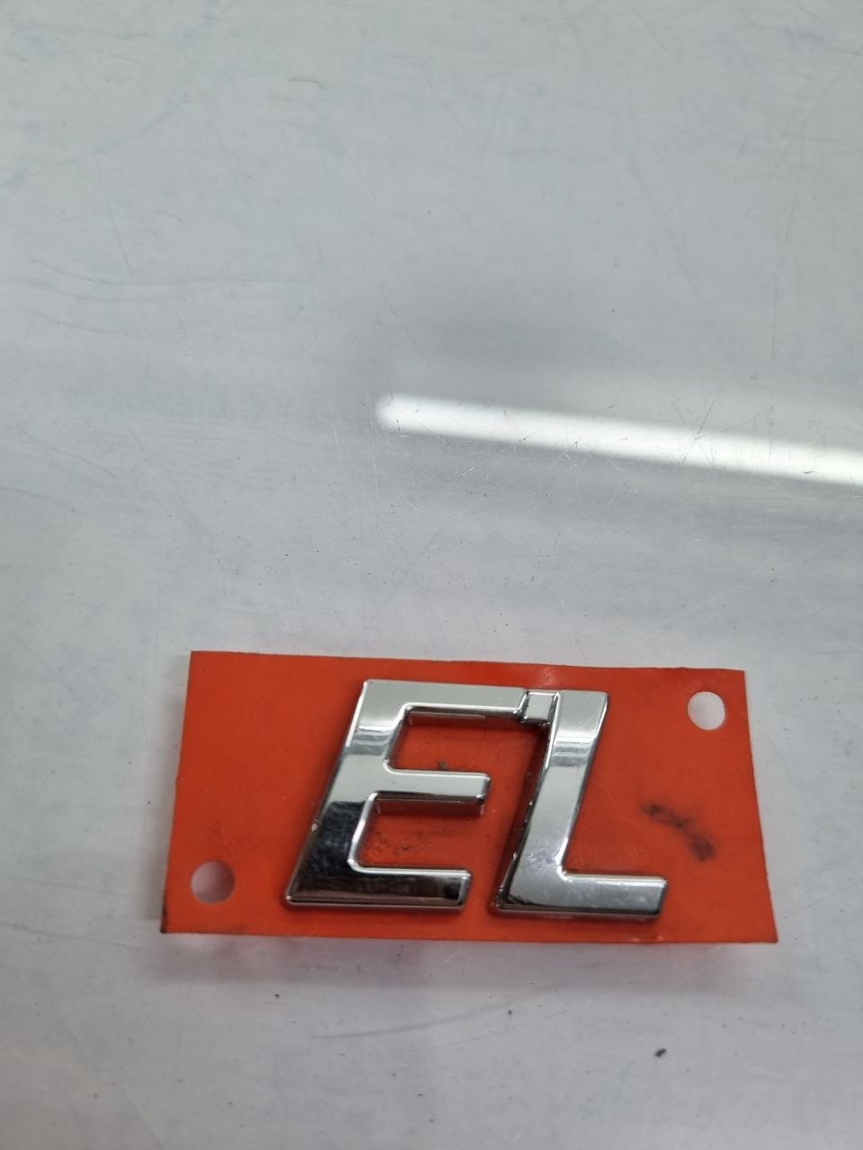 Emblema EL Tampa Traseira Fiat Siena/Strada 1996/2012 Novo