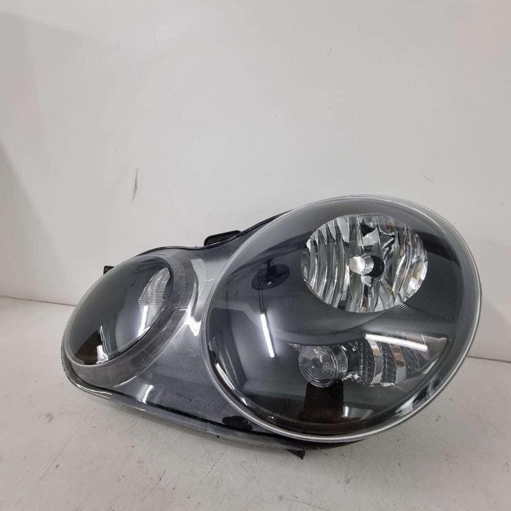 Farol Diant Esq Volkswagen Polo Hatch/Sedan 2002/2005