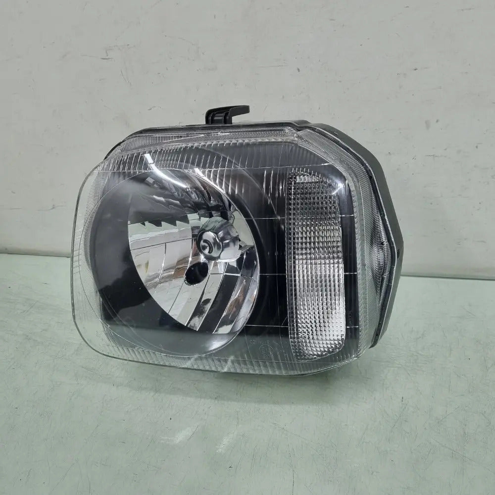 Farol Esquerdo Suzuki Jimny 2003/2018