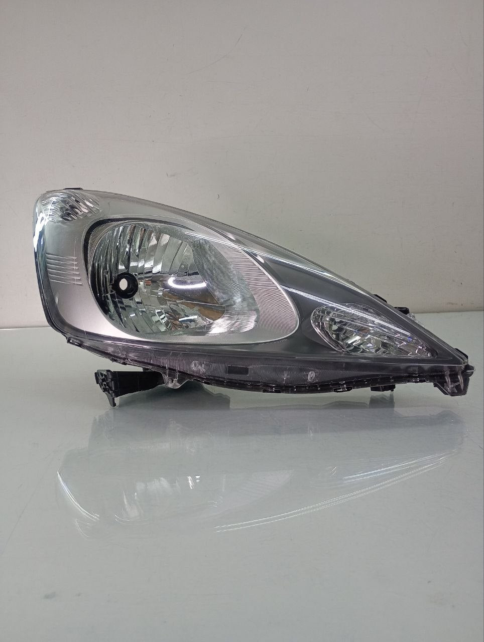 farol direito fita 2009/2012
Masc Negra canhão cromado