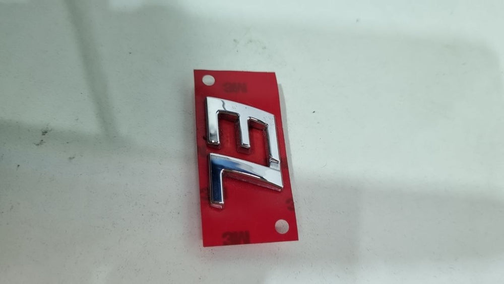 Emblema EL Fiat Siena Strada 2004/2017