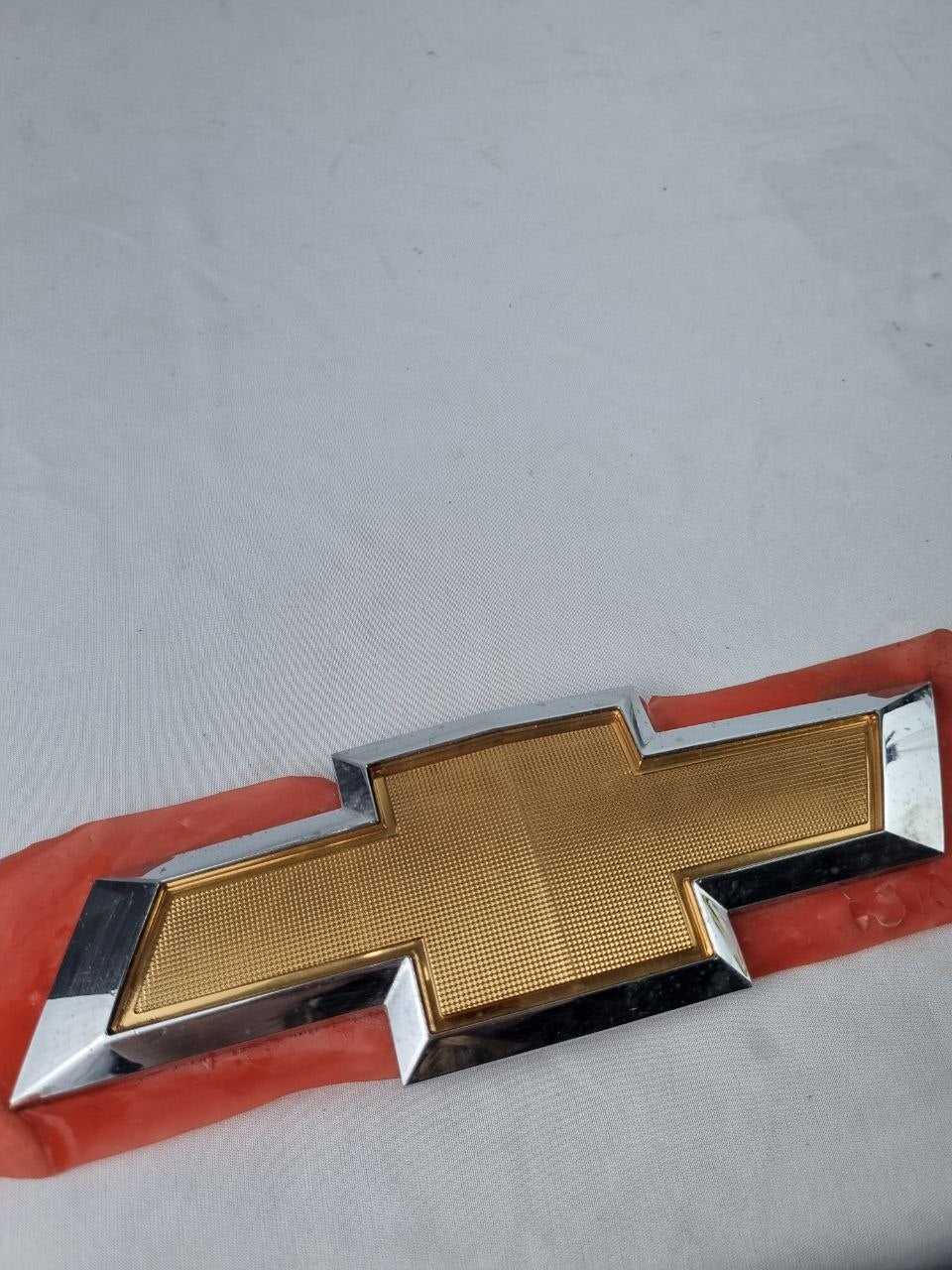 Emblema Gravata Tras Chevrolet Cobalt 2012/2016