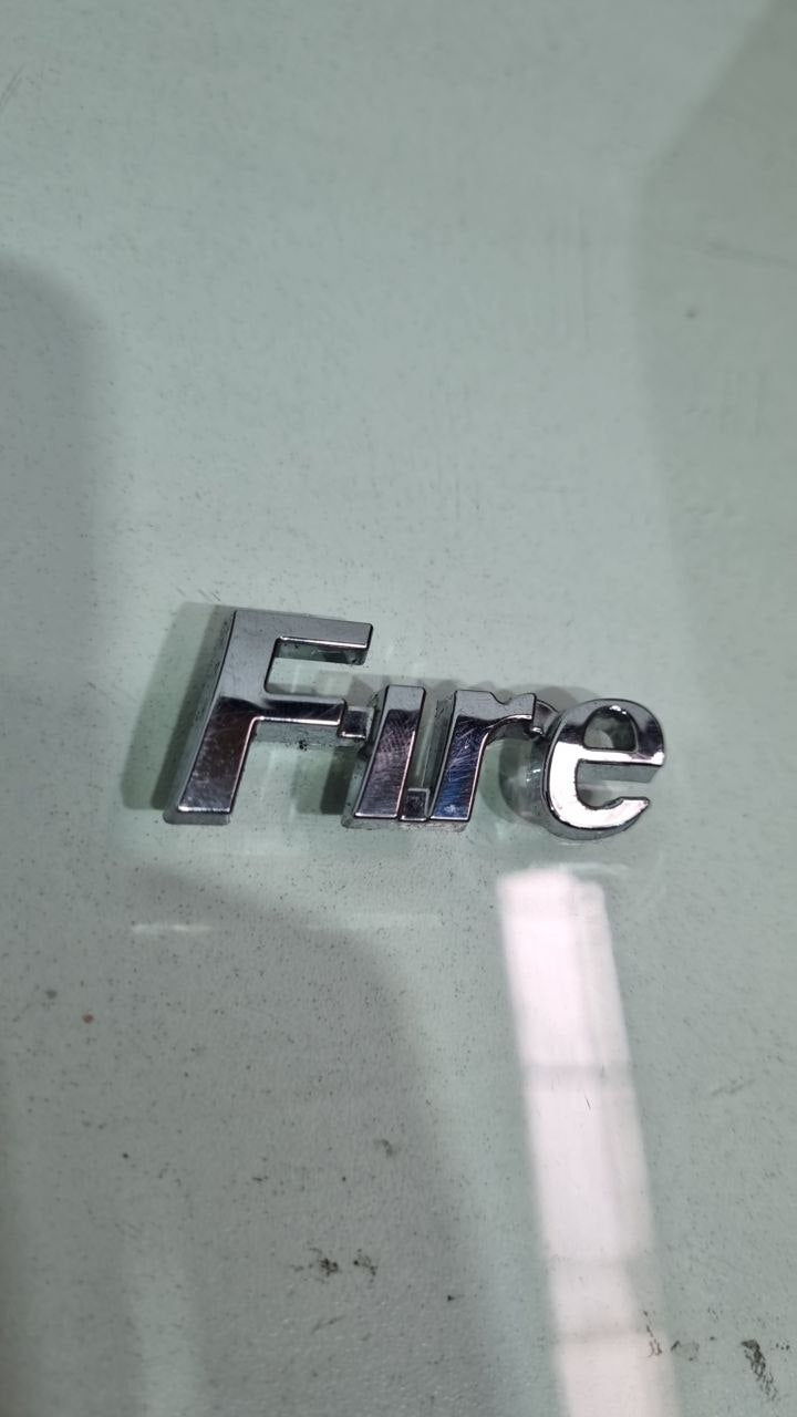 Emblema Fire Fiat Palio Uno Strada Doblo 2001/2012