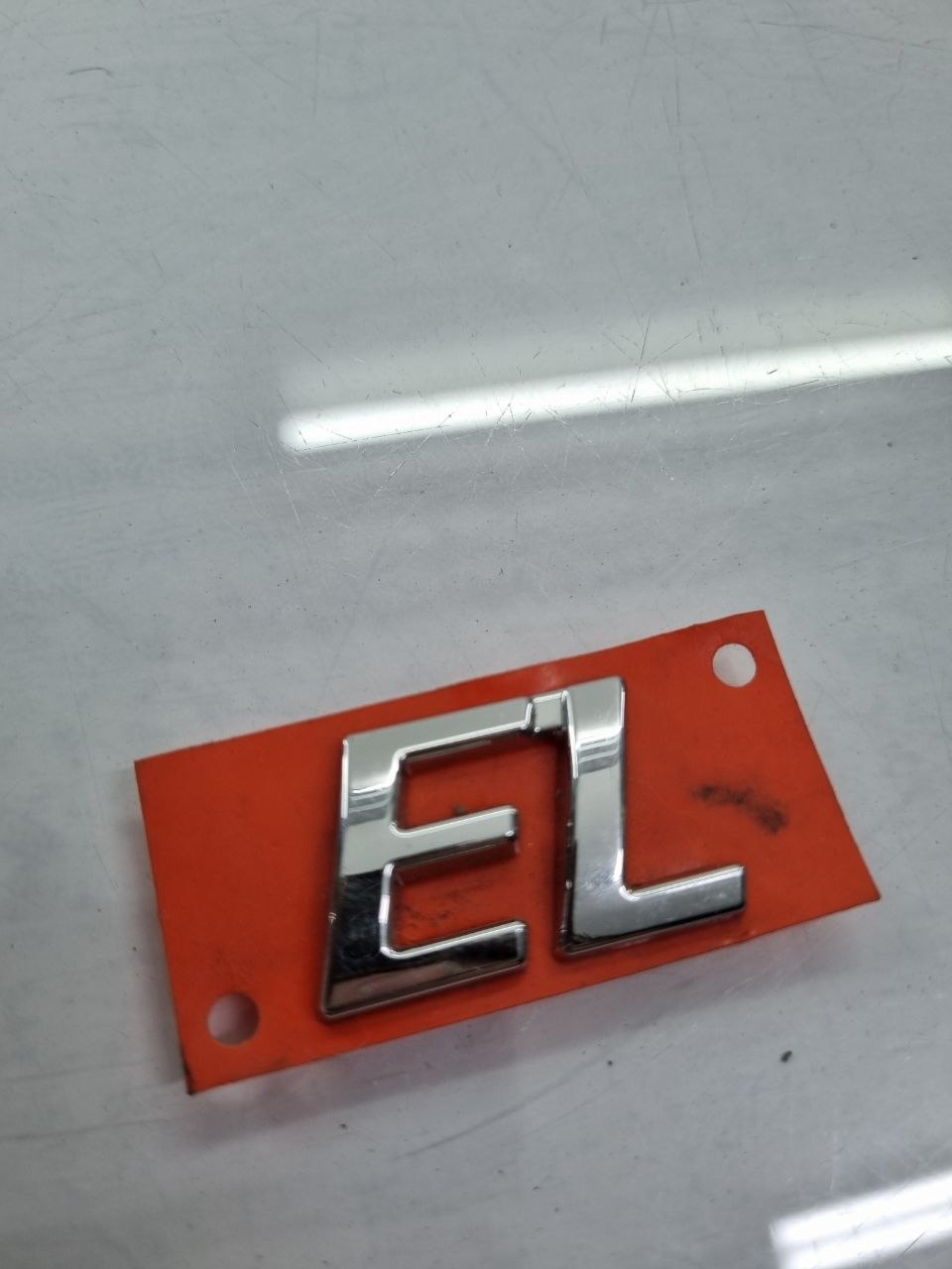 Emblema EL Tampa Traseira Fiat Siena/Strada 1996/2012 Novo