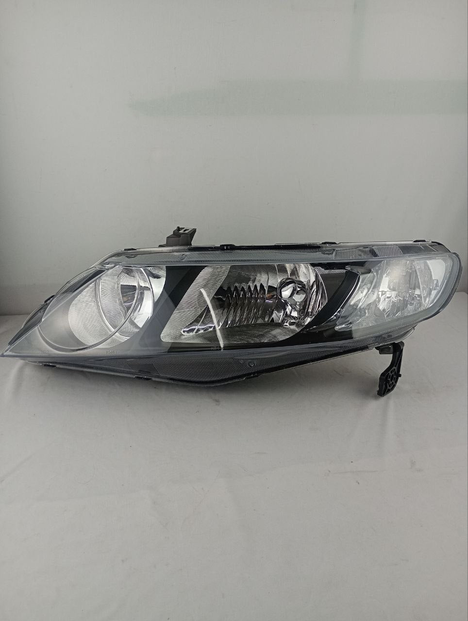 Farol esquerdo Civic 2006/2011