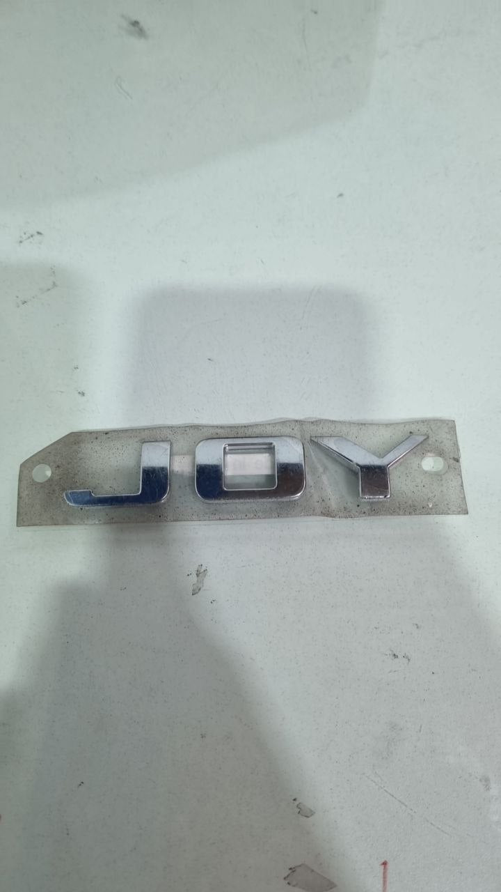 Emblema Tras Tampa Joy Chevrolet Onix/Prisma 2017/2021