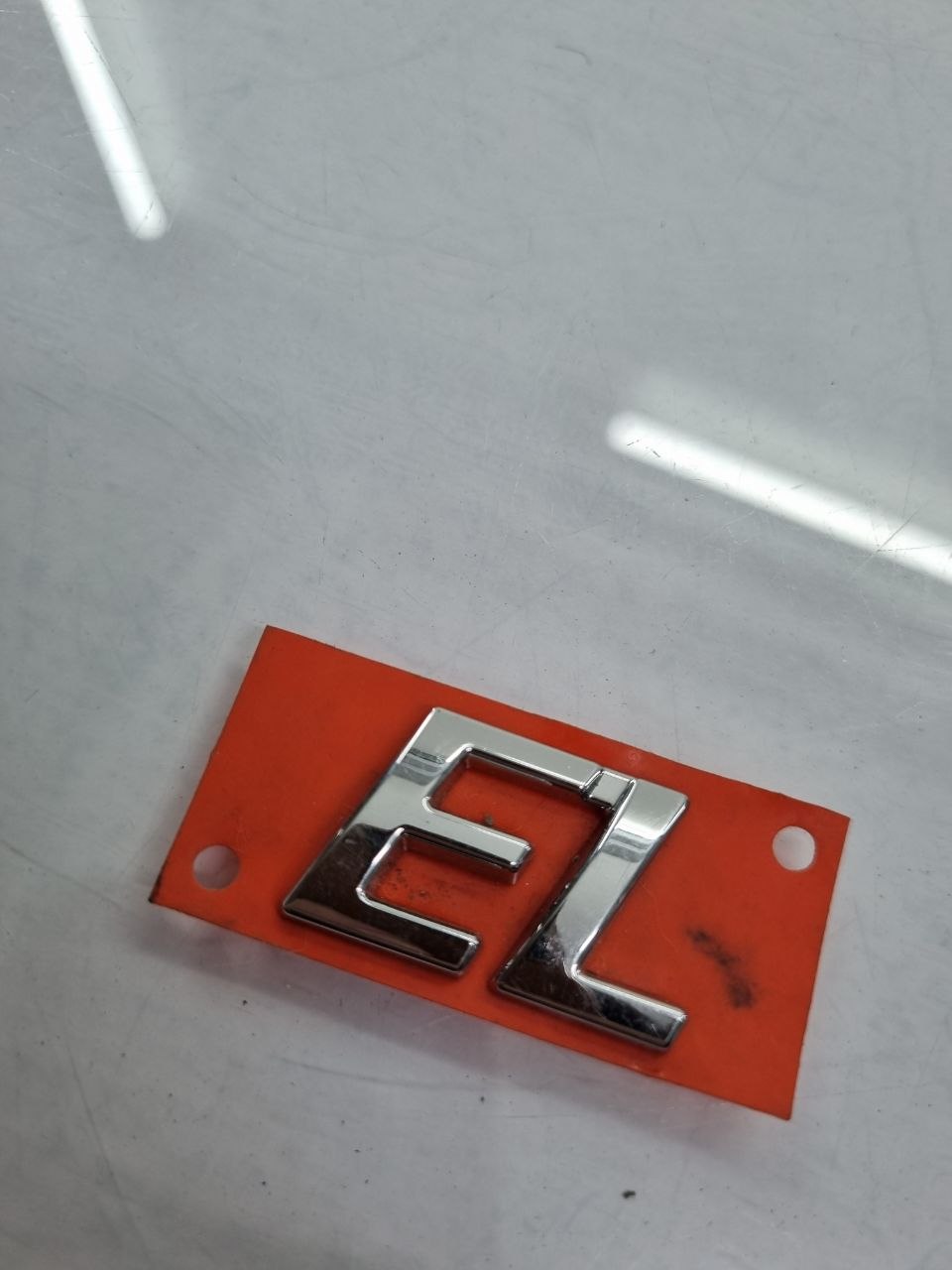 Emblema EL Tampa Traseira Fiat Siena/Strada 1996/2012 Novo