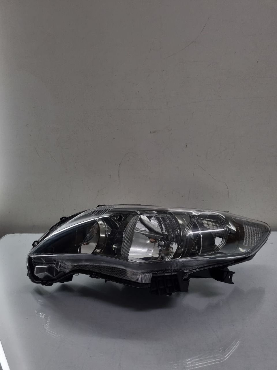 Farol Esquerdo Corolla 2012/2014 Masc Negra TYC