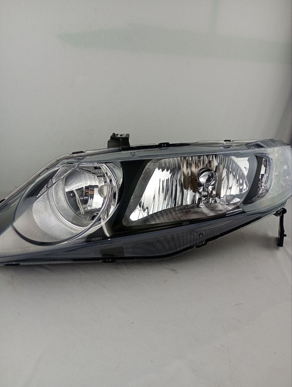 Farol esquerdo Civic 2006/2011