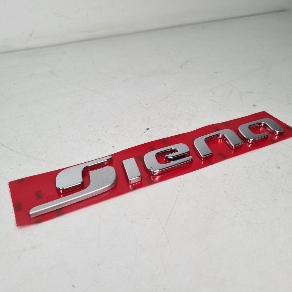 Emblema Tampa Traseira Fiat Siena 2012/2018