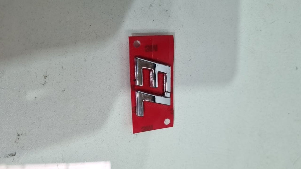 Emblema EL Fiat Siena Strada 2004/2017