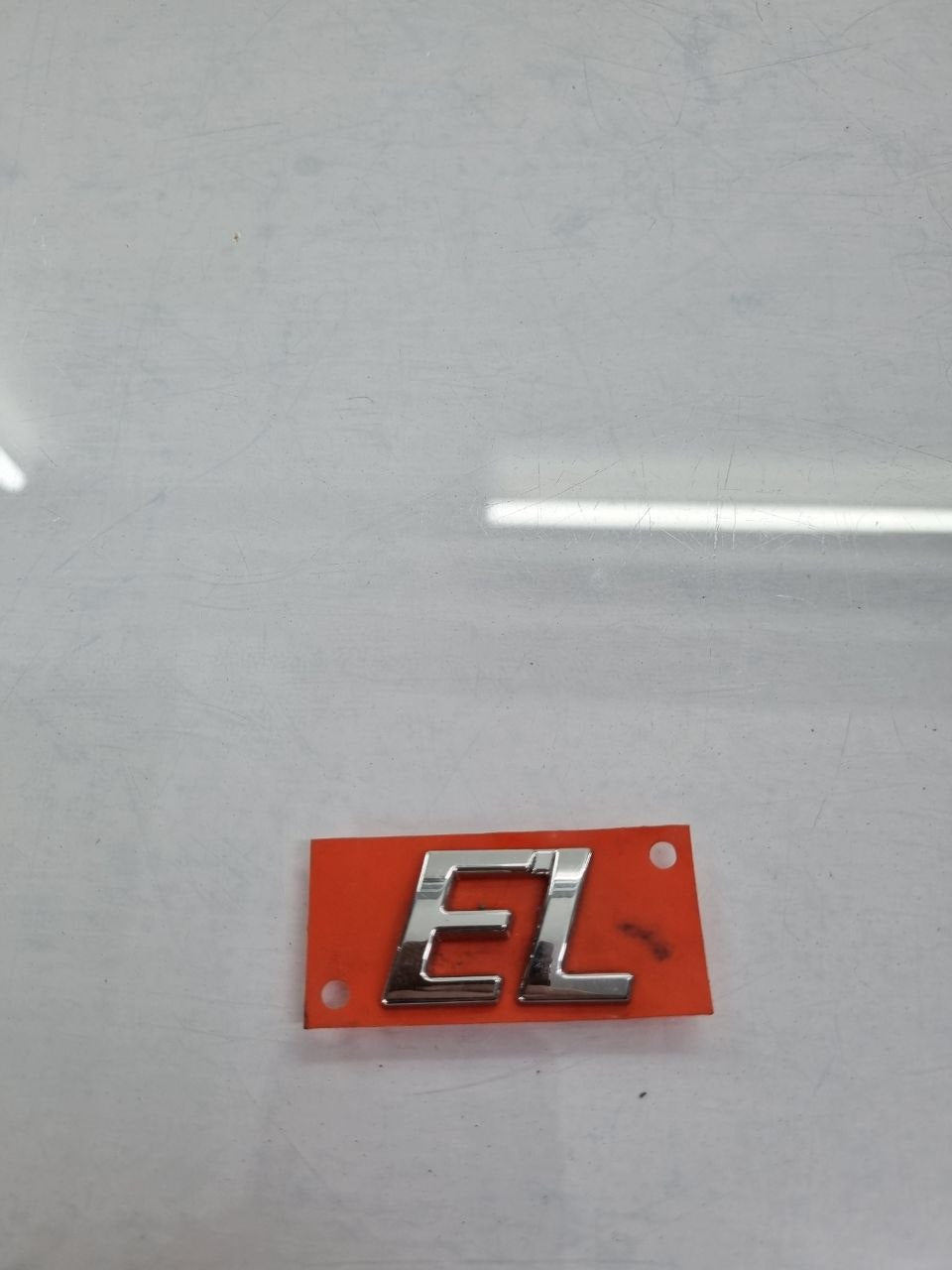 Emblema EL Tampa Traseira Fiat Siena/Strada 1996/2012 Novo