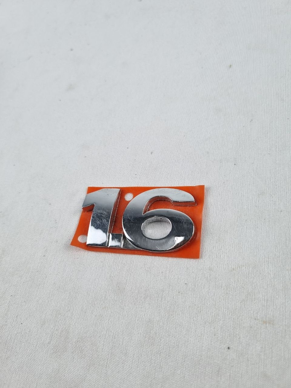 Emblema Tras 1.6 Volkswagen Gol Voyage Fox 2004/2010