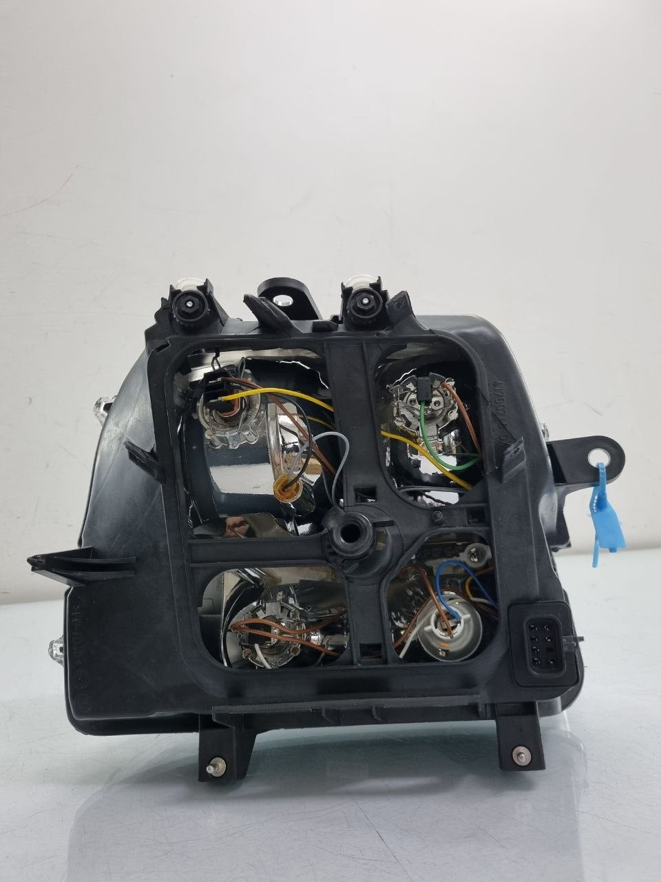 Farol lado esquerdo cromado com auxiliar doblo 2002 a 2010