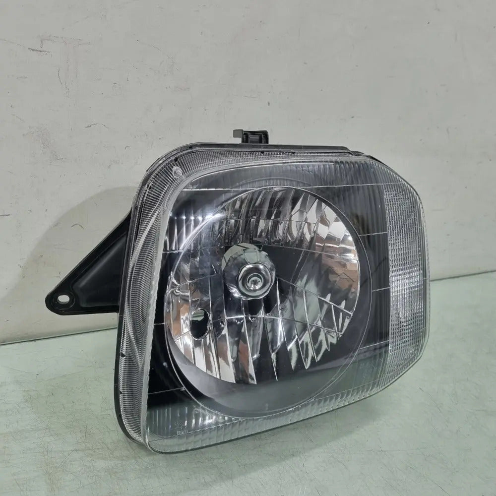 Farol Esquerdo Suzuki Jimny 2003/2018