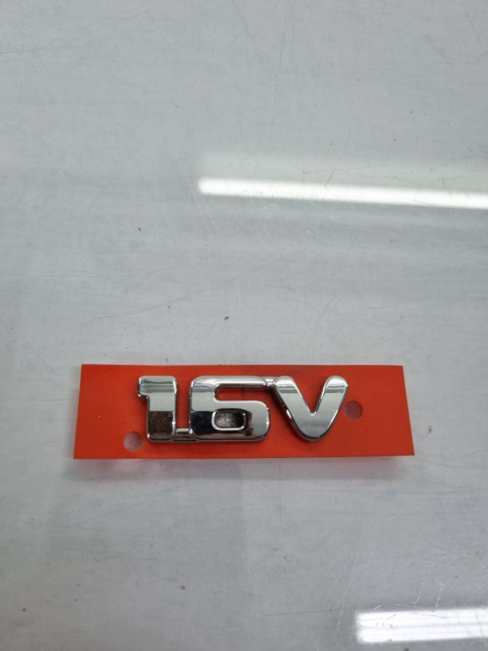 Emblema 1.6V Cromado Fiat Palio Strada Idea Punto Grand Siena 2011/2016 Novo