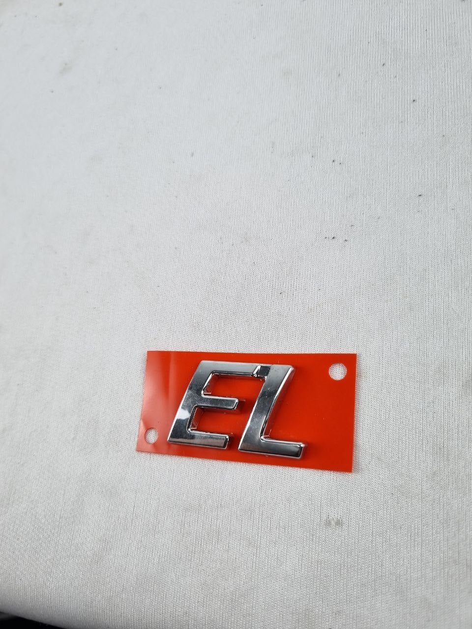 Emblema EL Tampa Traseira Fiat Siena/Strada 1996/2004
