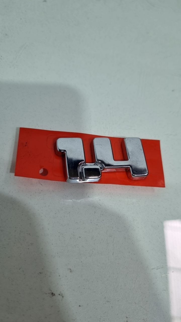 Emblema Tras 1.4 Fiat Strada Palio Siena Uno 2000/2023