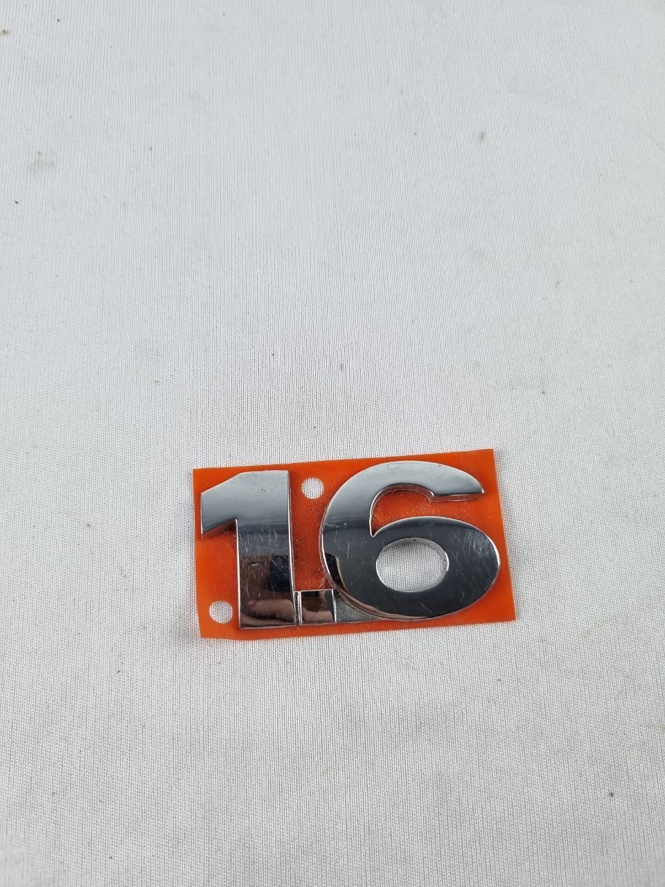 Emblema Tras 1.6 Volkswagen Gol Voyage Fox 2004/2010