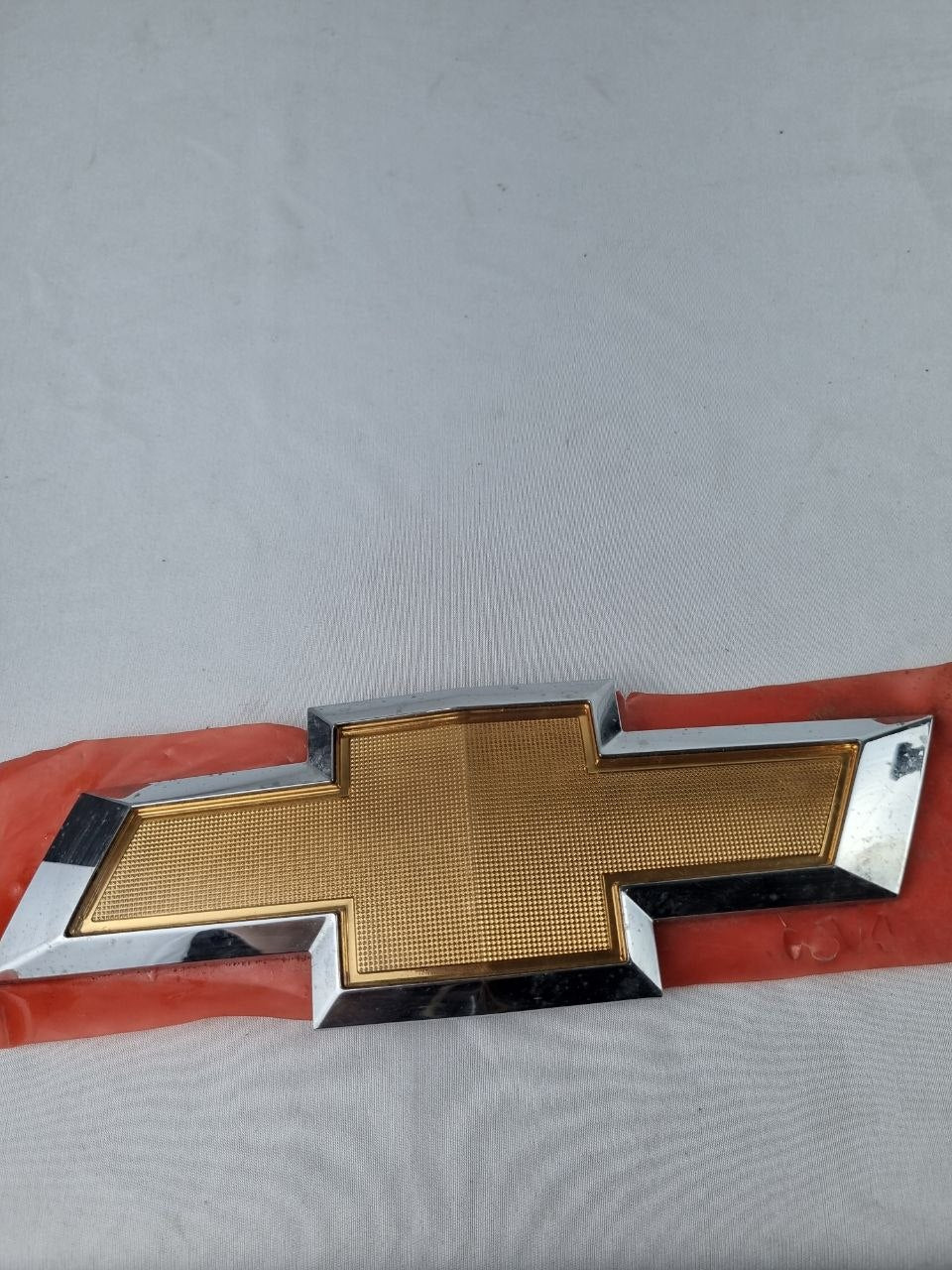 Emblema Gravata Tras Chevrolet Cobalt 2012/2016