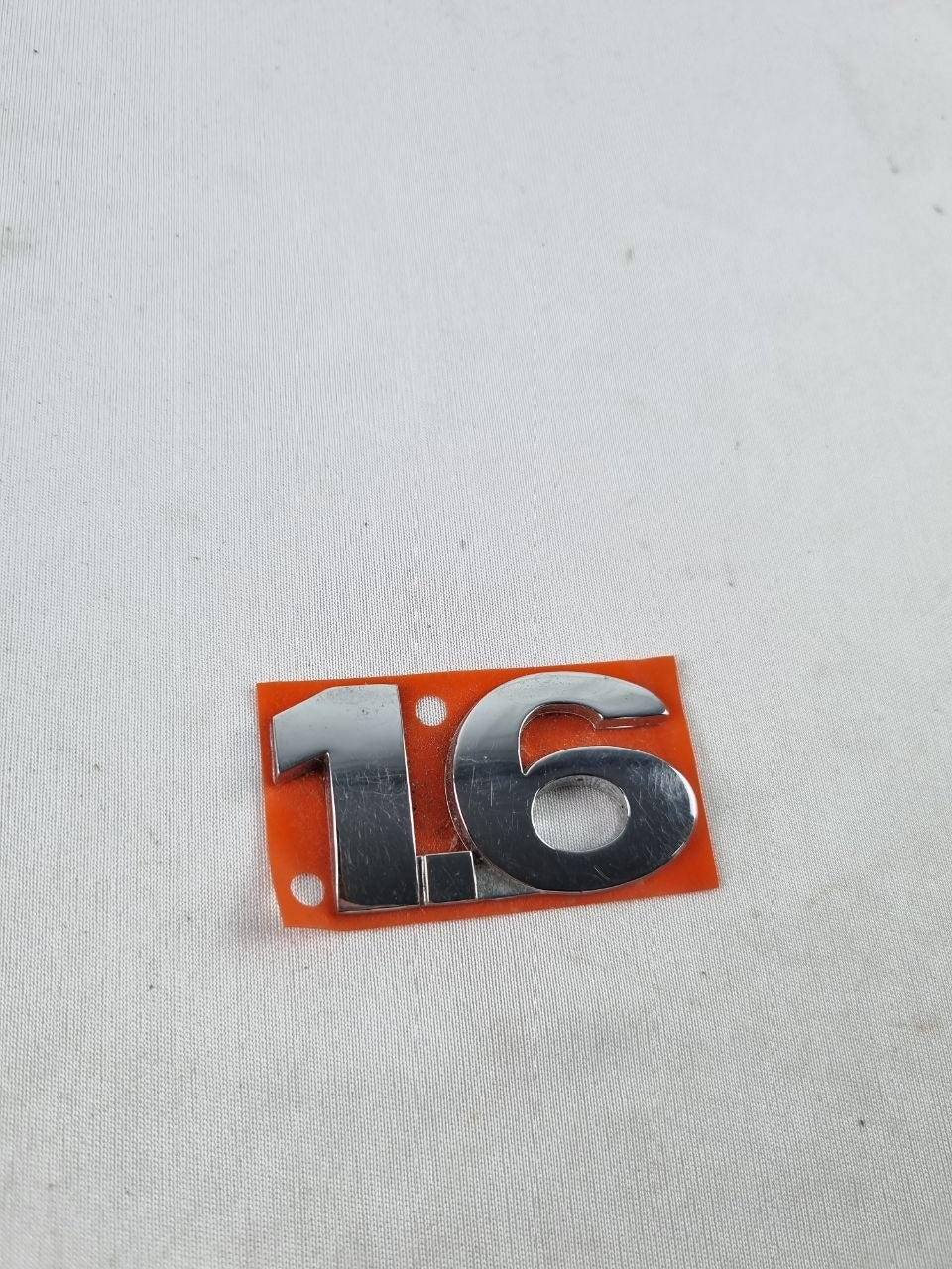 Emblema Tras 1.6 Volkswagen Gol Voyage Fox 2004/2010