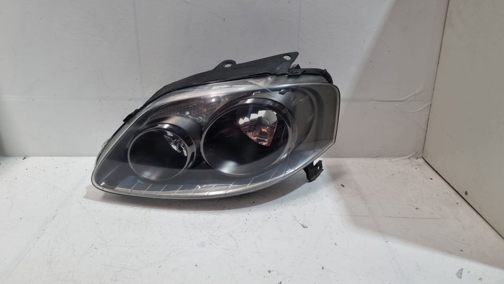 Farol Dianteiro Esquerdo VW Fox 2003/2009 Usado